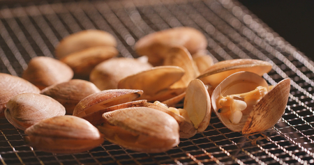 Delicious BBQ calm on grill の写真素材