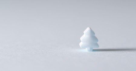 Blue christmas tree candy and shadow の写真素材