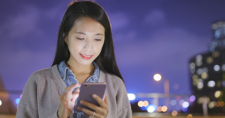 Asian young woman use of smart phone の写真素材