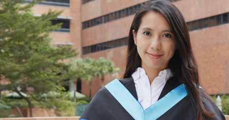 Young woman graduation in university の写真素材