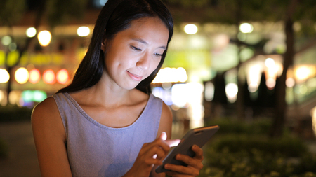 Woman using smart phoneの写真素材