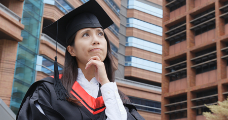 Young woman get graduation の写真素材