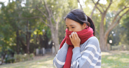 Woman feeling cold in the winter timeの写真素材