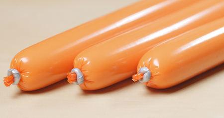 Snack Sausage with plastic wrapping の写真素材
