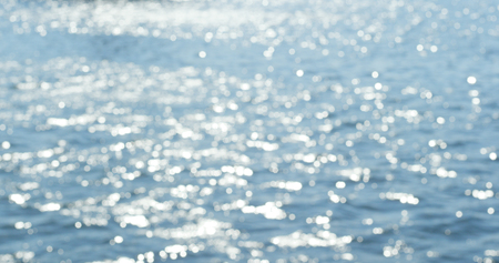 Blur view of Sparks on the sea wave の写真素材