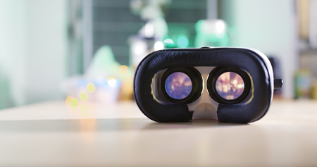 Virtual reality device playing video at night の写真素材