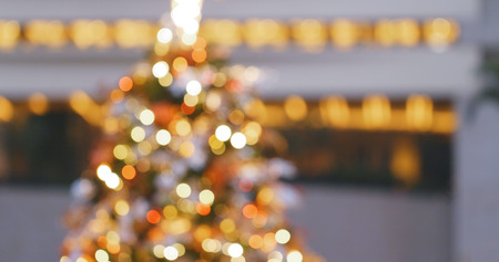 Bokeh of christmas tree decoration in golden color の写真素材