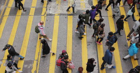 Mong Kok, Hong Kong 28 February 2018:- Top view of people crossing the road in city のeditorial素材