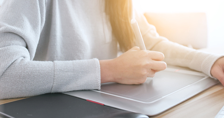 Designer working on computer の写真素材