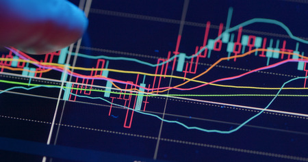 Stock market analysis on digital tablet