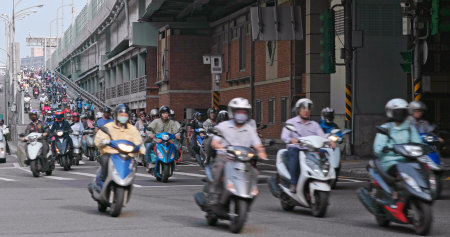 Dihua Street, Taipei city, 27 May 2018:- Motorway with busy Motorbike traffic in taipei city