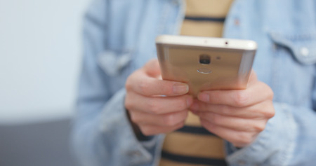 Close up using mobile phoneの写真素材