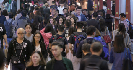 Causeway Bay, Hong Kong, 17 March 2018:- People walking in the street at nightのeditorial素材
