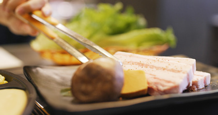 Traditional Korean barbecue in restaurantの写真素材