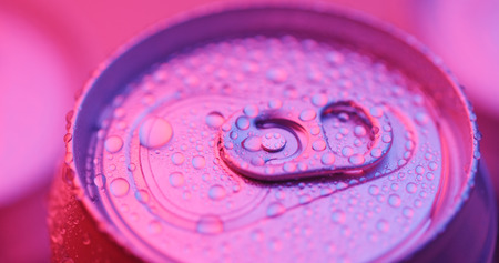 Beer can with purple and pink light