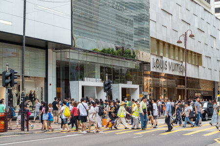 Tsim Sha Tsui, Hong Kong 17 August 2018:- People crossing the road in Hong Kong city