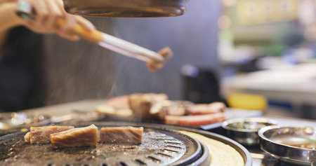 Korean BBQ in restaurantの写真素材