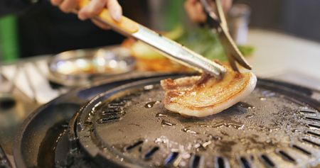 Roasted korean meat in restaurantの写真素材
