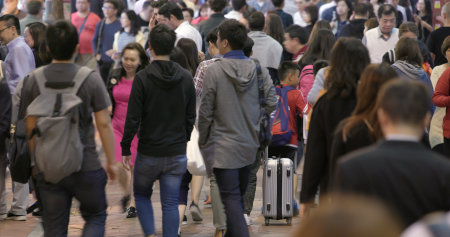 Causeway Bay, Hong Kong, 17 March 2018:- Crowded People crossing the street in city
