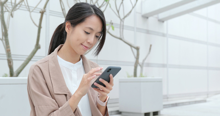 Young woman use of smart phoneの写真素材