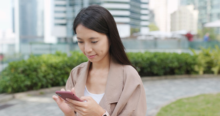 Woman use of cellphoneの写真素材