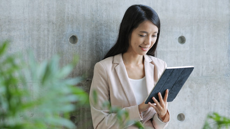 Business woman using tablet computerの写真素材