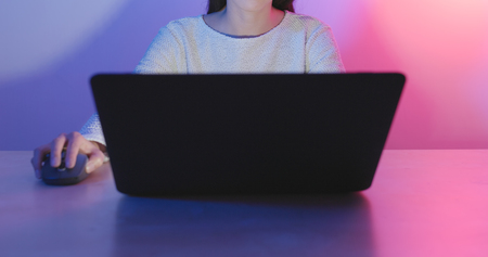 Woman using laptopの写真素材