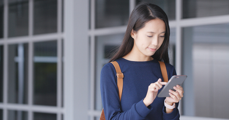 Woman using mobile phoneの写真素材