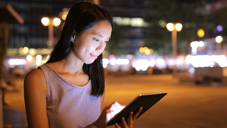 Woman using tablet computerの写真素材