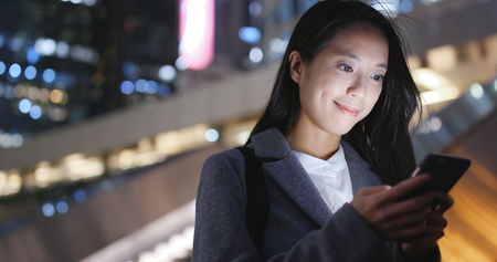 Asian business woman use of smart phoneの写真素材
