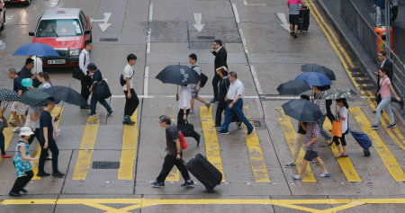 Central, Hong Kong, 10 October 2018:- top view of people cross the road in rain dayのeditorial素材