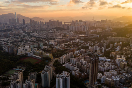 Kowloon peninsula, Hong Kong, 13 September 2018:- Hong Kong city under sunsetのeditorial素材
