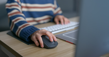 Woman work on computer at nightの写真素材