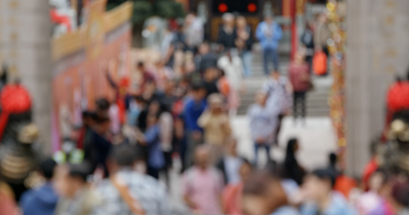 Blur of people visit chinese templeの写真素材
