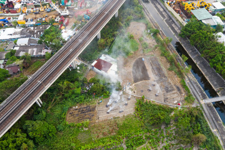 Tin Shui Wai, Hong Kong, 29 September 2018:- Hong Kong city with fire smoke burn in the fieldのeditorial素材
