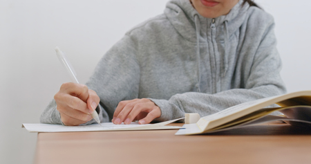 Woman write on the bookの写真素材