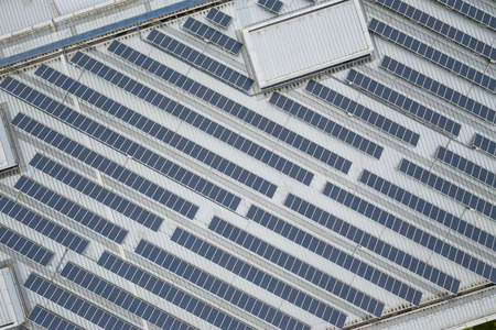 Solar panel station on roof top building