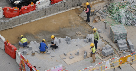 Hong Kong, -28 January 2019: Worker pave the roadのeditorial素材