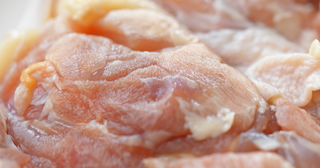 Raw chicken thighの写真素材