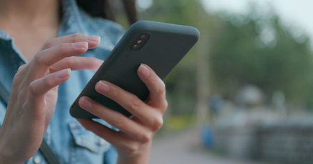 Woman using smart phoneの写真素材
