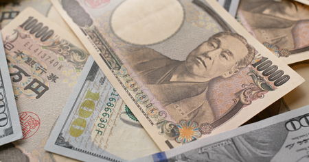 USD and Japanese Yen banknoteの写真素材