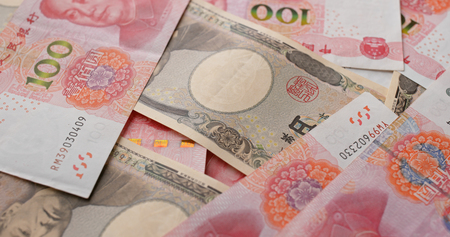 Chinese RMB and Japanese Yen banknoteの写真素材