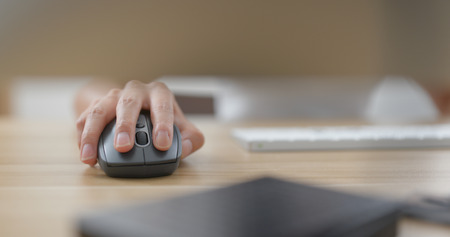 Woman use of computer inside officeの写真素材
