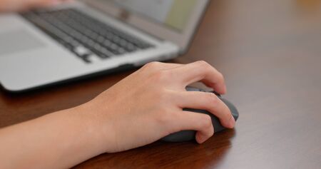 Close up of woman work on laptop computer