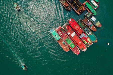 Top down view of fishing boat on the sea in Hong Kongの写真素材