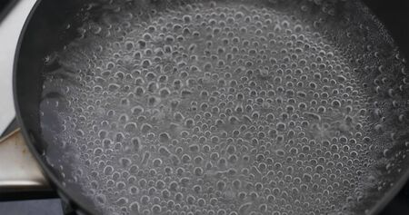 Boil water in the kitchenの写真素材