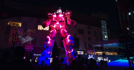 Tokyo, Japan 30 June 2019: Unicorn Gundam robot statue in odaiba at nightのeditorial素材