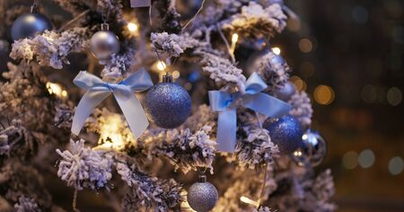 Christmas tree decoration with light in blue color at nightの写真素材