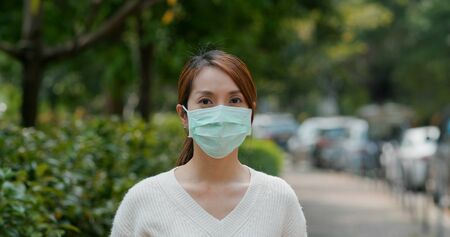 Woman wear face mask at outdoor
