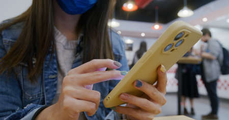 Woman use of mobile phone at outdoor